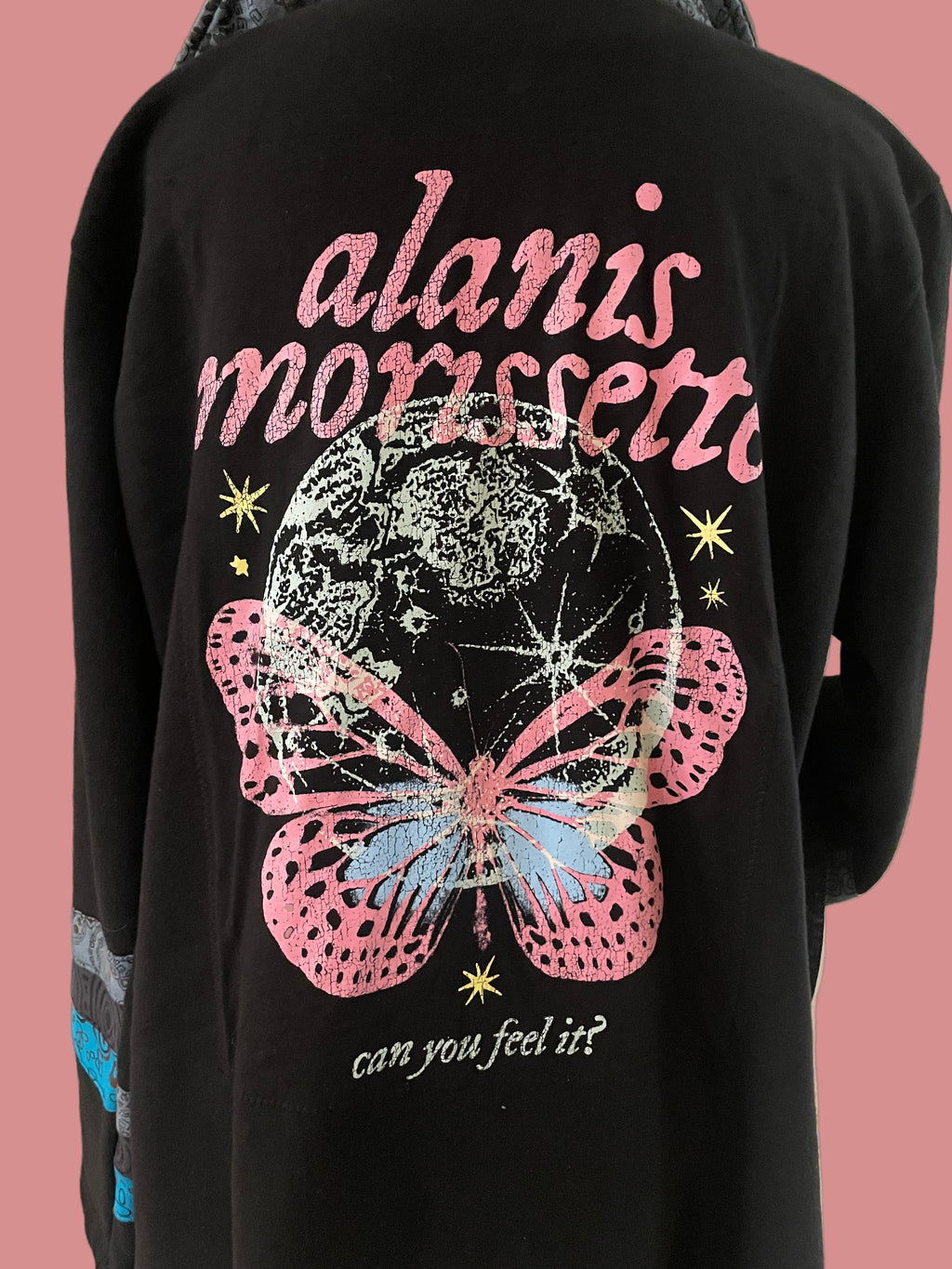 Black sweatshirt with Alanis Morissette pink butterfly design 